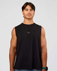 Man wearing Base Heavyweight FLXCotton Tank Regular Fit -8cm - Black | Model:George | Size:M