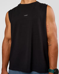 Man wearing Base Heavyweight FLXCotton Tank Regular Fit -8cm - Black | Model:George | Size:M