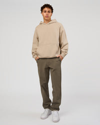 Man wearing Base Oversized Hoodie - Shale Beige | Model:Leandro | Size:M |