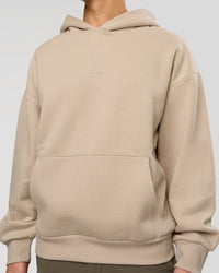 Man wearing Base Oversized Hoodie - Shale Beige | Model:Leandro | Size:M | | Thumbnail Index: 1