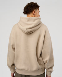 Man wearing Base Oversized Hoodie - Shale Beige | Model:Leandro | Size:M |