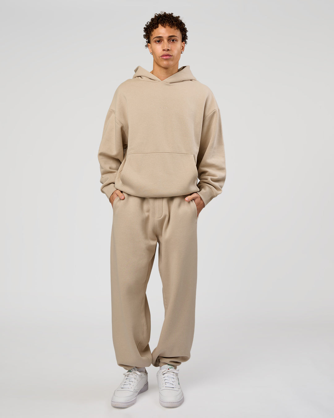 Man wearing Base Oversized Hoodie - Shale Beige | Model:Leandro | Size:M |