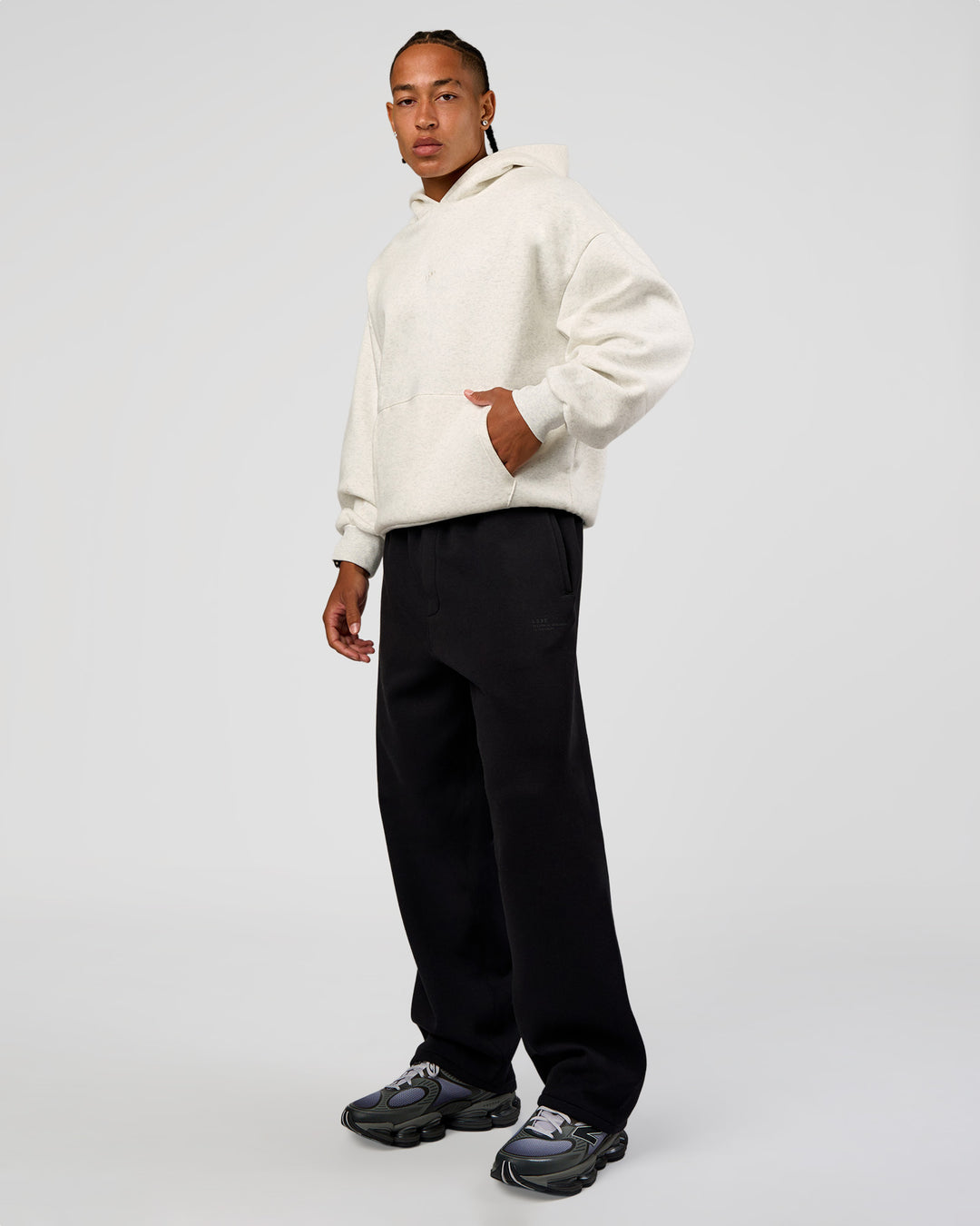 Man wearing Base Oversized Hoodie - Silver Marl | Model:Malebo | Size:M