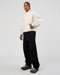 Man wearing Base Oversized Hoodie - Silver Marl | Model:Malebo | Size:M