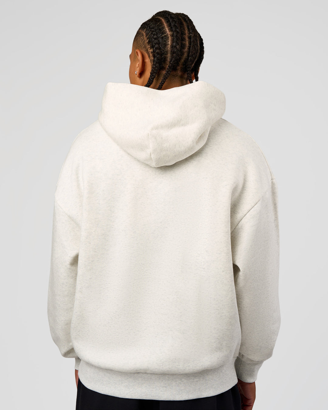 Man wearing Base Oversized Hoodie - Silver Marl | Model:Malebo | Size:M