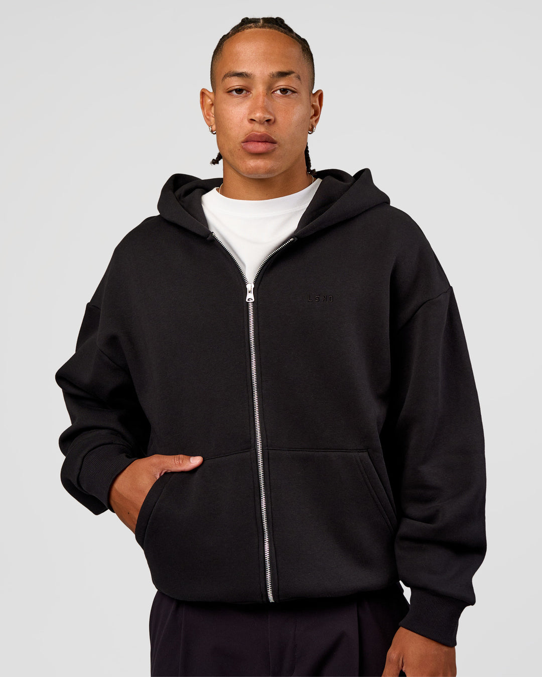 Man wearing Base Zip Through Oversized Hoodie - Black | Model:Malebo | Size:M