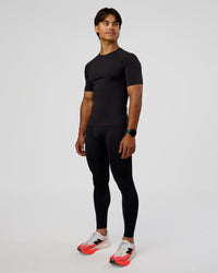 Man wearing BaseTech 26" Leggings - Black | Model:George | Size:M