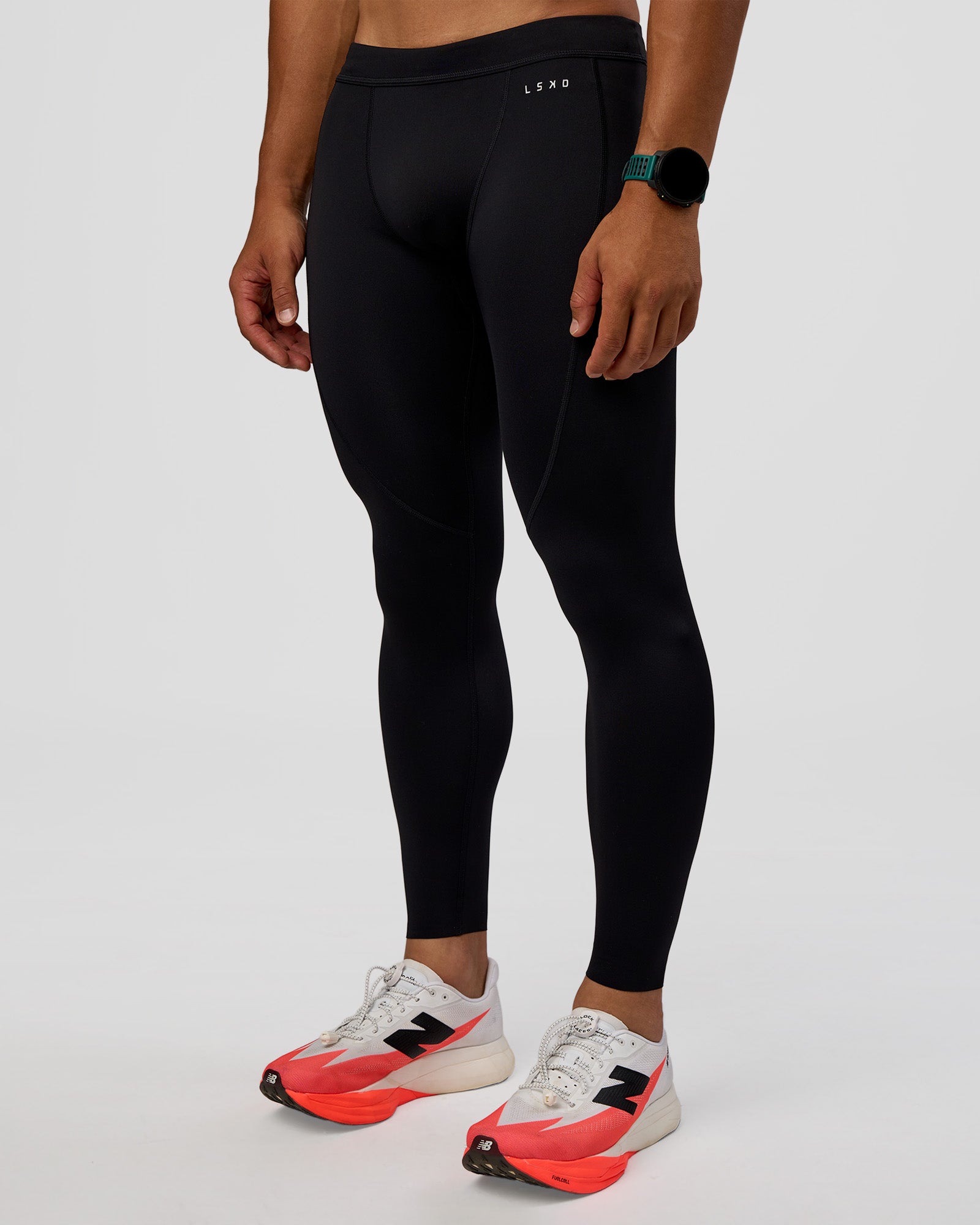 Man wearing BaseTech 26" Leggings - Black | Model:George | Size:M