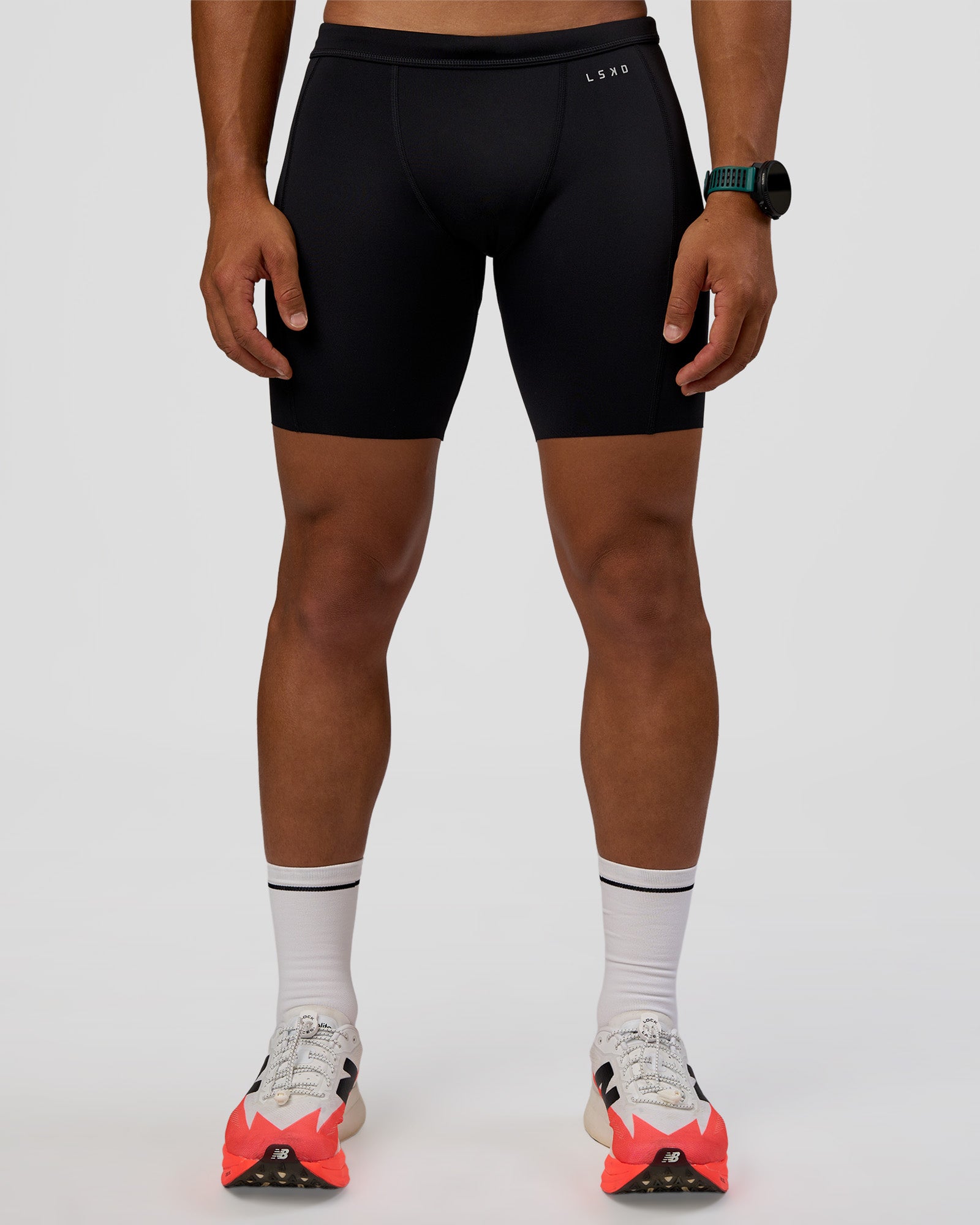 Man wearing BaseTech 8" Shorts - Black | Model:George | Size:M