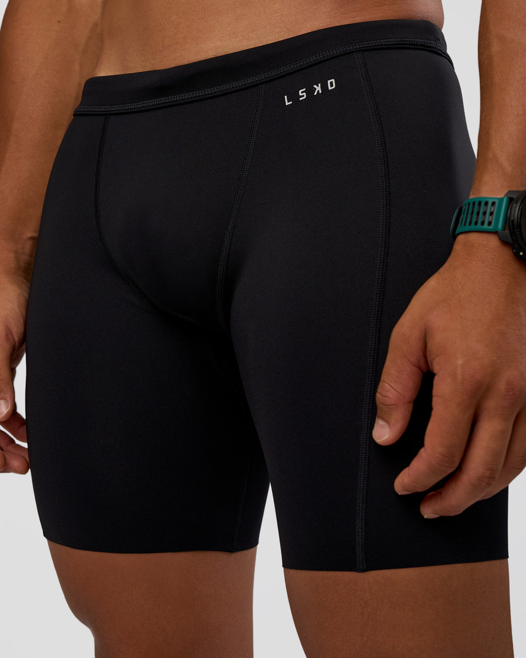 Man wearing BaseTech 8" Shorts - Black | Model:George | Size:M