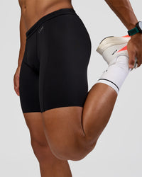 Man wearing BaseTech 8" Shorts - Black | Model:George | Size:M