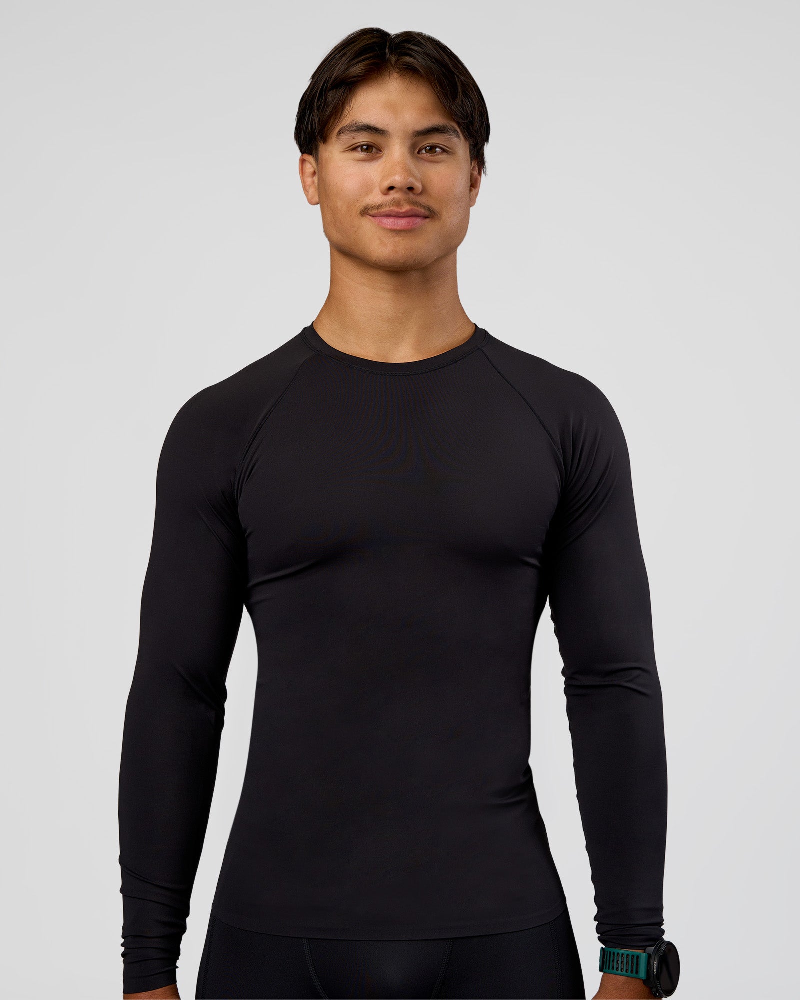 Man wearing BaseTech Long Sleeve Tee - Black | Model:George | Size:M