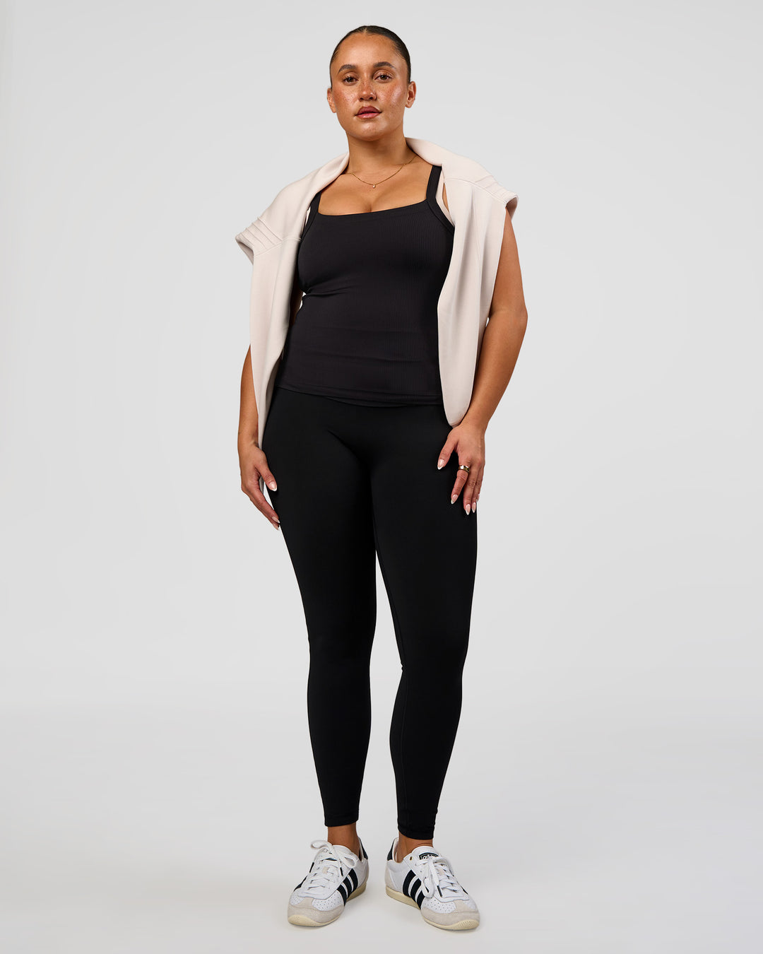 Woman wearing CF Fold Over High-Rise Full Length Legging - Black | Model:Simmy | Size:M - view 4