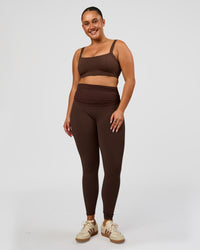 Woman wearing CF Fold Over High-Rise Full Length Legging - Hot Chocolate | Model:Simmy | Size:M