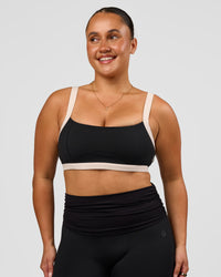 Woman wearing CF Move Through It Sports Bra - Black-Clay | Model:Simmy | Size:M