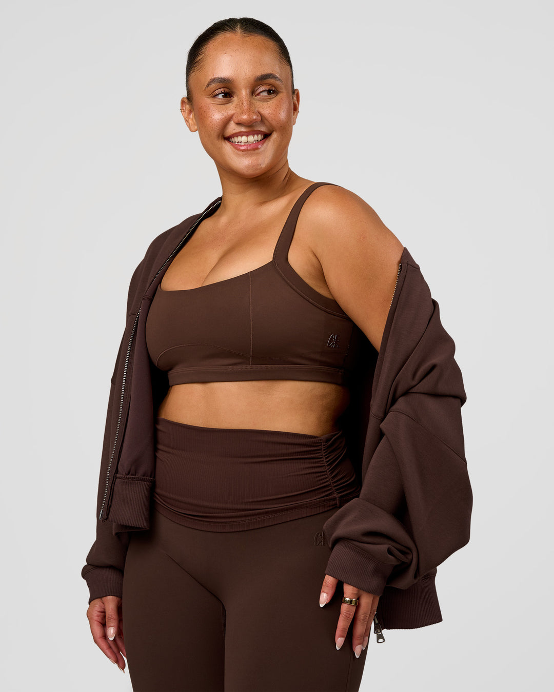 Woman wearing CF Move Through It Sports Bra - Hot Chocolate | Model:Simmy | Size:M