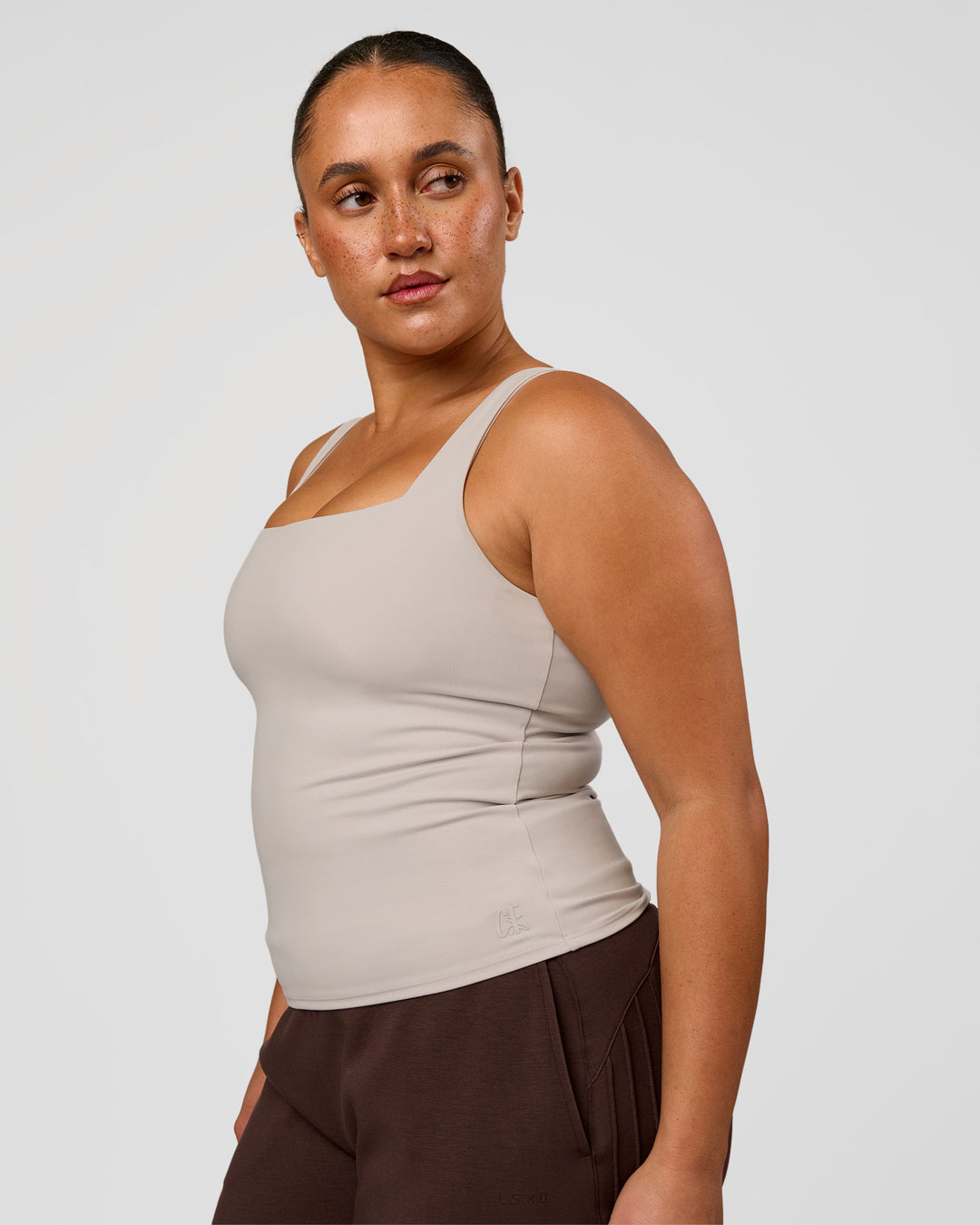 Woman wearing CF Train Hard Shelf Bra Tank - Clay | Model:Simmy | Size:M