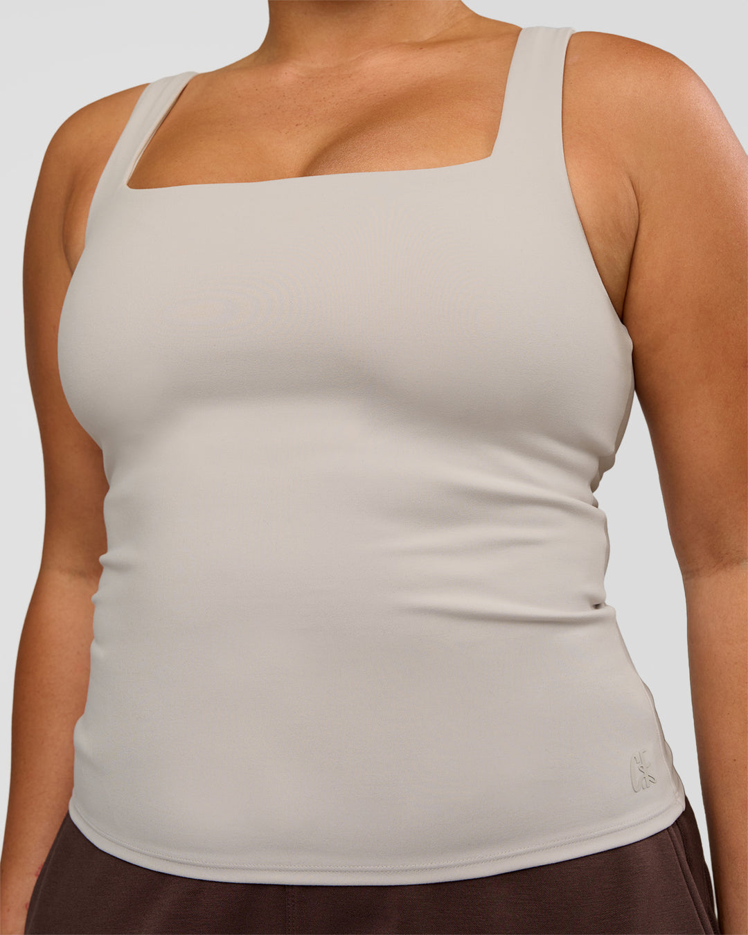 Woman wearing CF Train Hard Shelf Bra Tank - Clay | Model:Simmy | Size:M