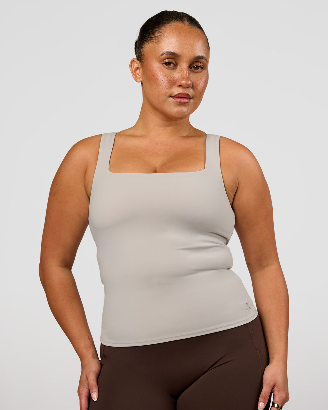 Woman wearing CF Train Hard Shelf Bra Tank - Clay | Model:Simmy | Size:M