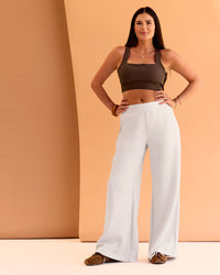 Woman wearing CF Train Hard Sports Bra - Hot Chocolate | Model:Chloe | Size:M