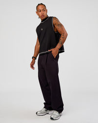 Man wearing CF Unisex Oversized Heavyweight Boxed Tank - Black-CF X LSKD Sport | Model:Malebo | Size:M | Thumbnail Index: 3