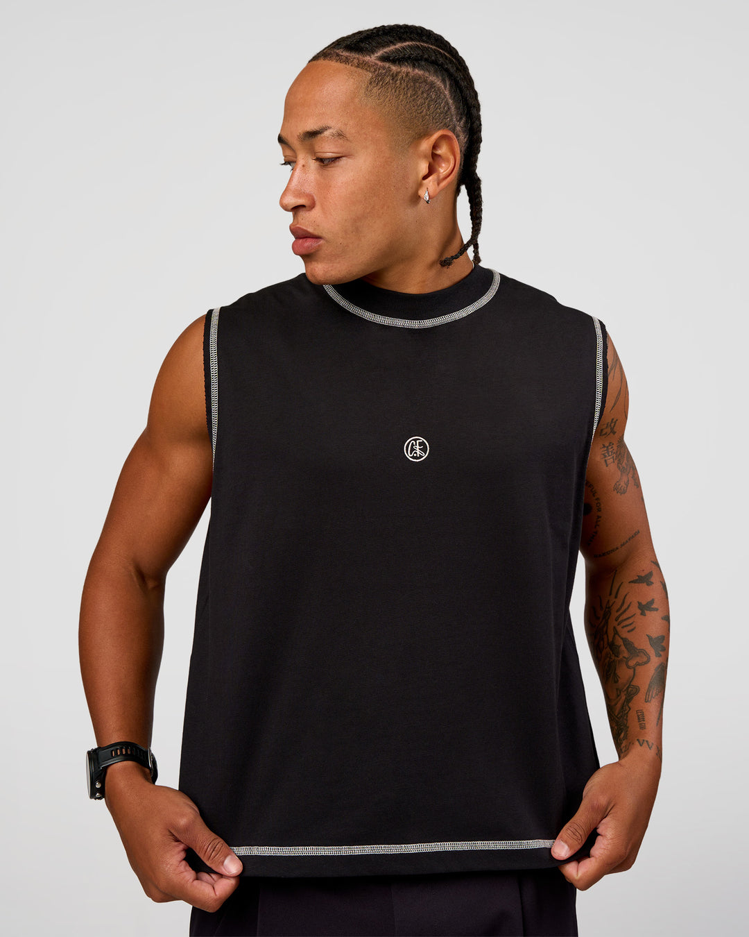 Man wearing CF Unisex Oversized Heavyweight Boxed Tank - Black-CF X LSKD Sport | Model:Malebo | Size:M - view 6