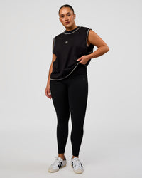 Woman wearing CF Unisex Oversized Heavyweight Boxed Tank - Black-CF X LSKD Sport | Model:Simmy | Size:M | Thumbnail Index: 10