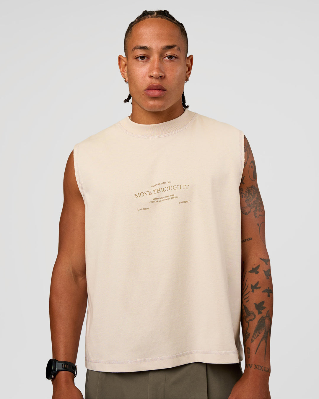 Man wearing CF Unisex Oversized Heavyweight Boxed Tank - Clay-CF Move Through It | Model:Malebo | Size:M