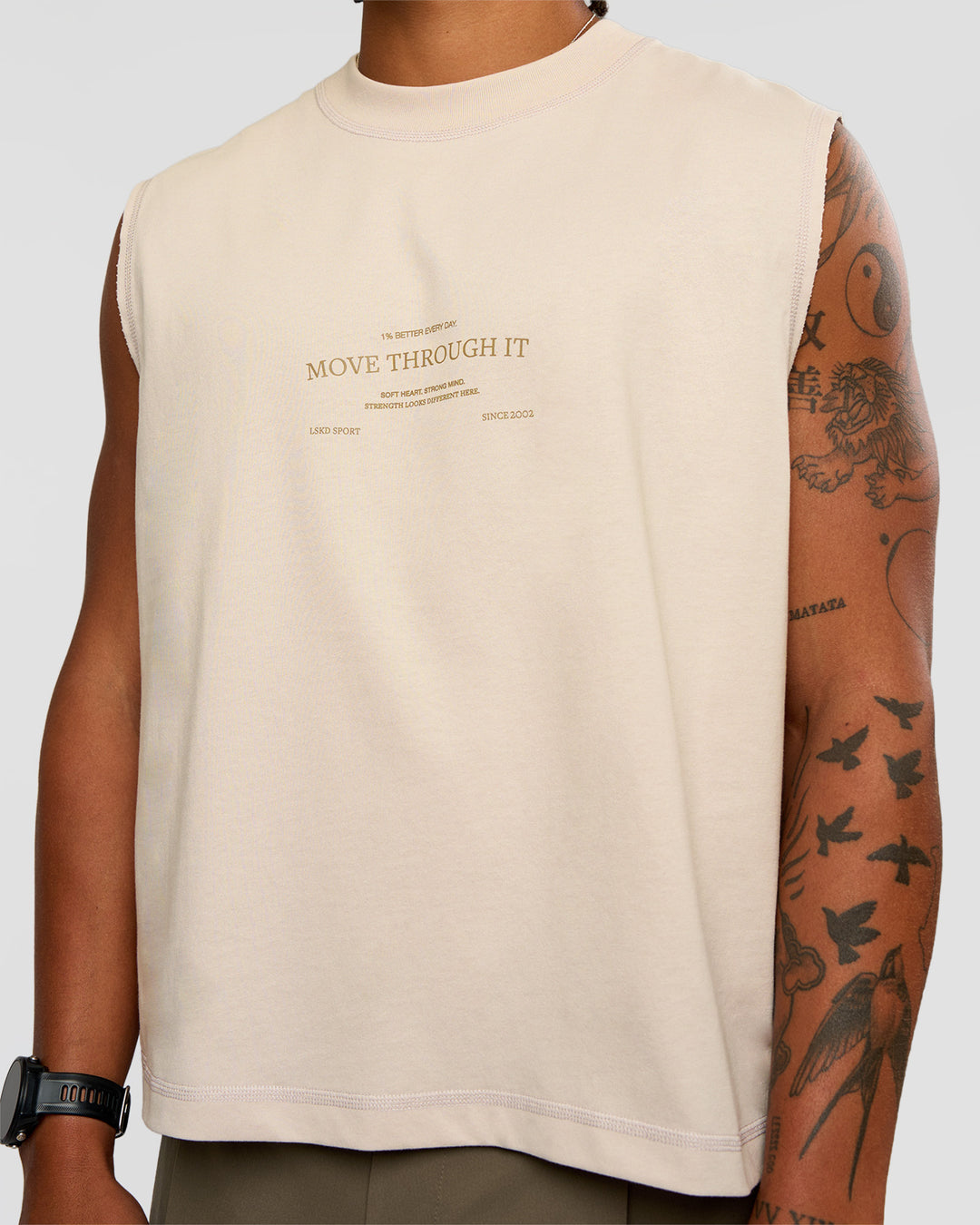 Man wearing CF Unisex Oversized Heavyweight Boxed Tank - Clay-CF Move Through It | Model:Malebo | Size:M