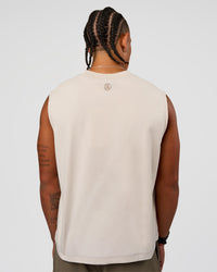 Man wearing CF Unisex Oversized Heavyweight Boxed Tank - Clay-CF Move Through It | Model:Malebo | Size:M