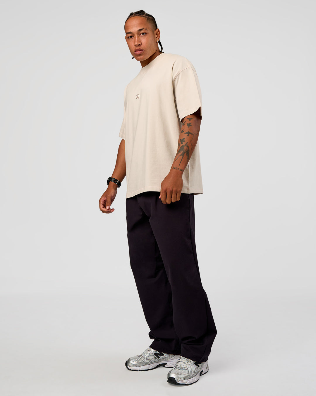 Man wearing CF Unisex Oversized Heavyweight FLXCotton Tee - Clay-CF X LSKD Sport | Model:Malebo | Size:M