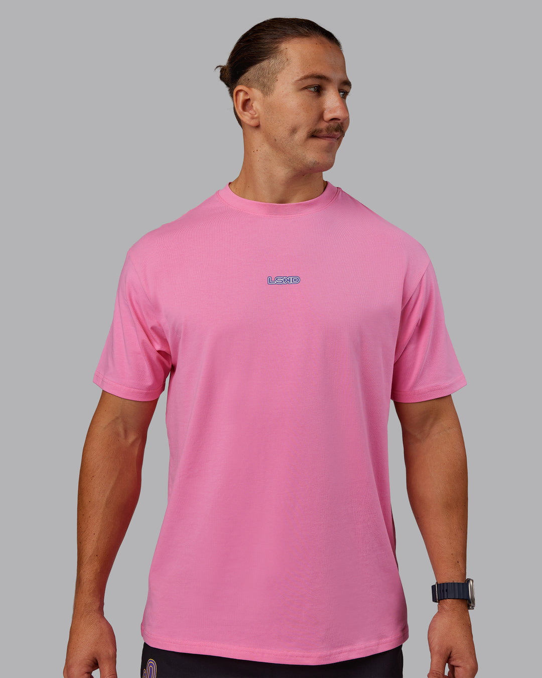 Man wearing CFT BNE 25 FLXCotton Oversized Tee - Candy Pink-Purple Opulence | Model:Jaiden | Size:M