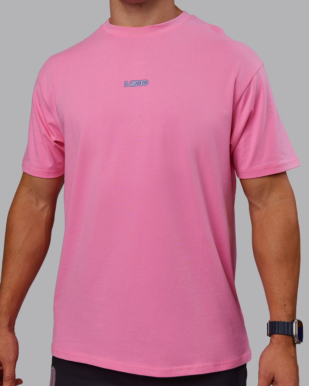 Man wearing CFT BNE 25 FLXCotton Oversized Tee - Candy Pink-Purple Opulence | Model:Jaiden | Size:M