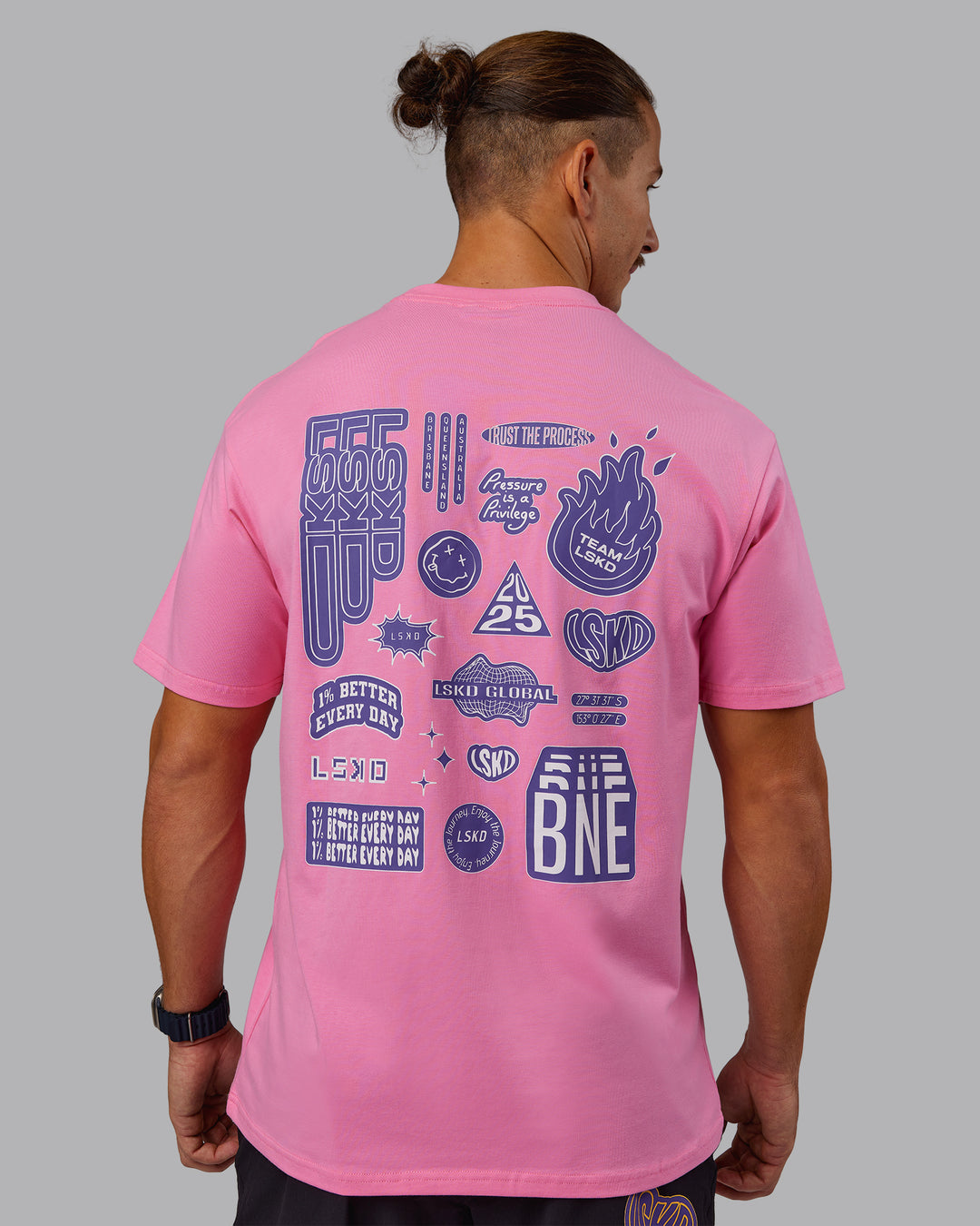 Man wearing CFT BNE 25 FLXCotton Oversized Tee - Candy Pink-Purple Opulence | Model:Jaiden | Size:M
