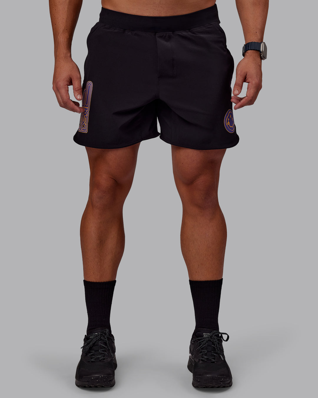 Man wearing CFT BNE 25 Lift 6" Short - Black-Warm Apricot | Model:Jaiden | Size:M