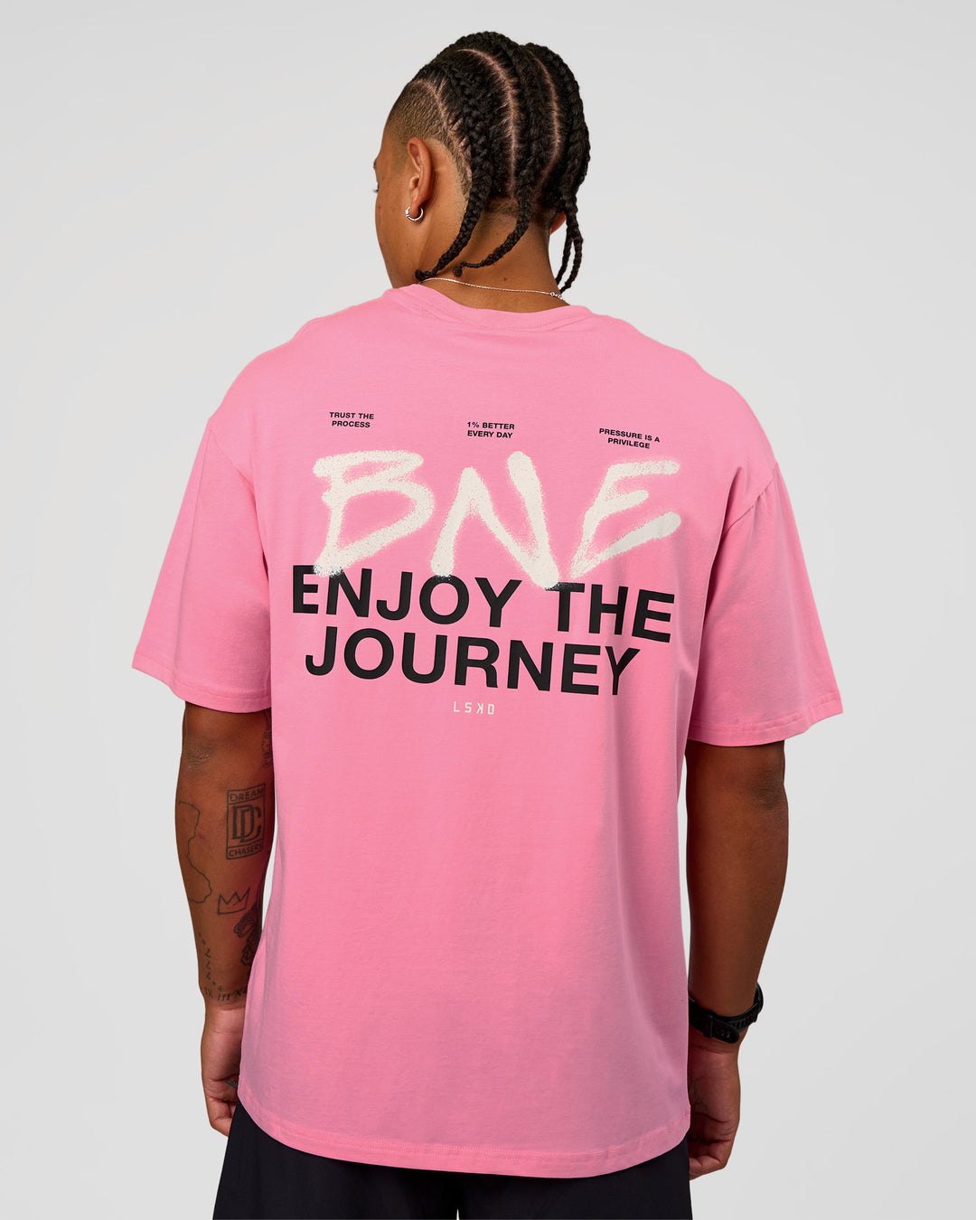 Man wearing CFT BNE 26 FLXCotton Oversized Tee in Candy Pink | Model:Malebo | Size:M