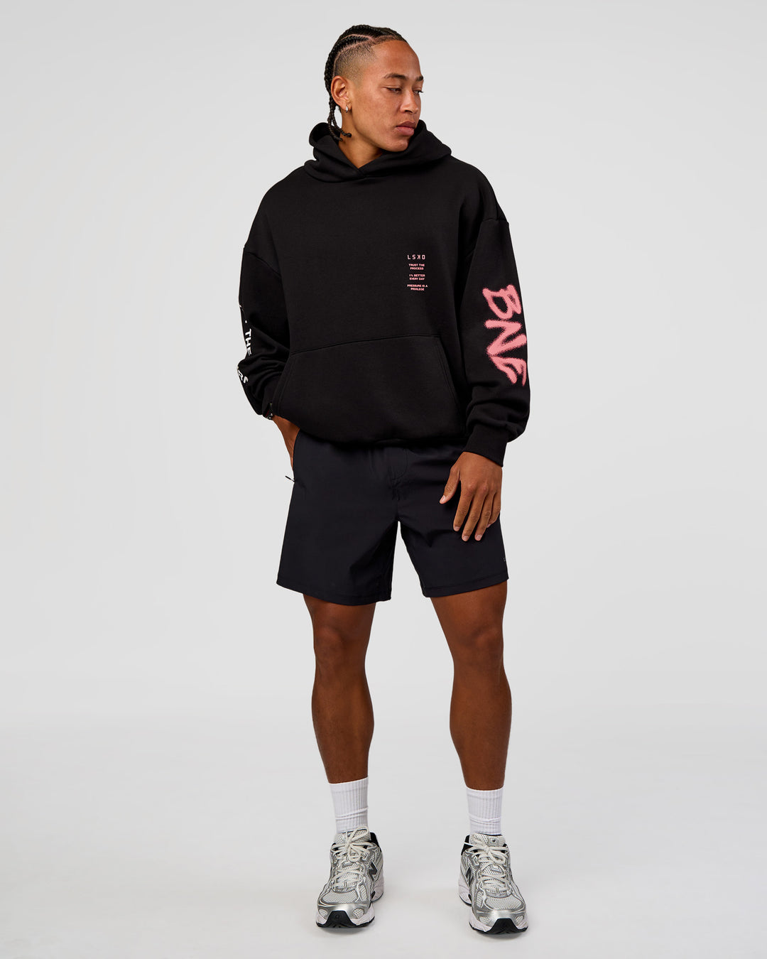 Man wearing CFT BNE 26 Unisex Oversized Hoodie - Black-Candy Pink | Model:Malebo | Size:M - view 3