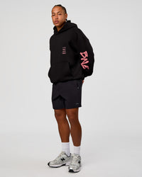 Man wearing CFT BNE 26 Unisex Oversized Hoodie - Black-Candy Pink | Model:Malebo | Size:M | Thumbnail Index: 4