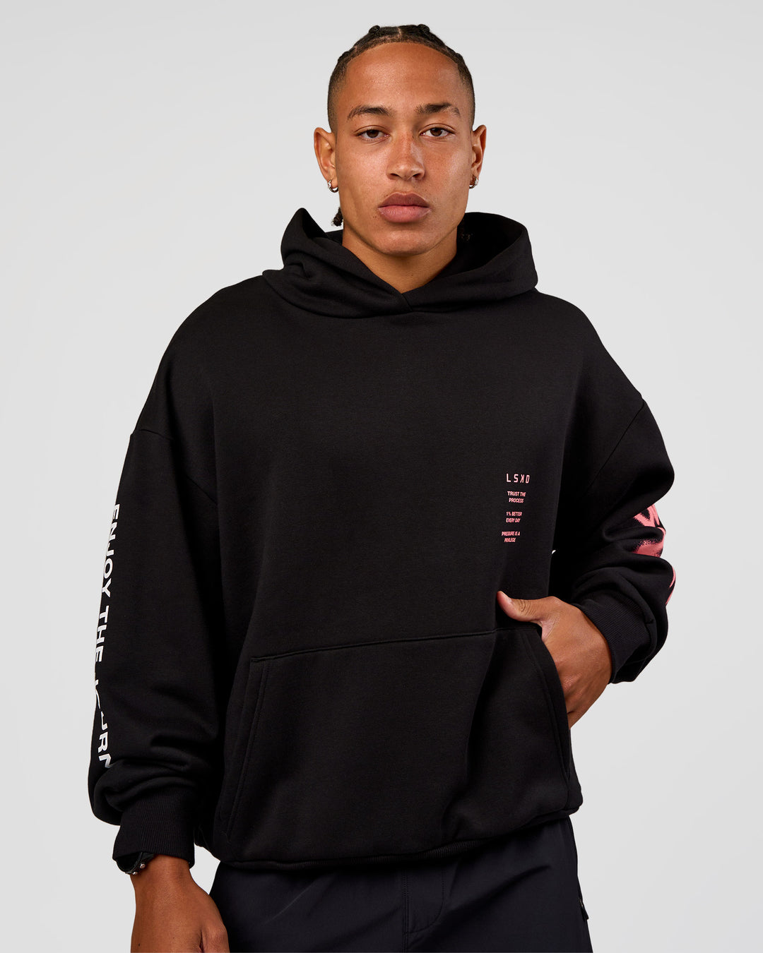Man wearing CFT BNE 26 Unisex Oversized Hoodie - Black-Candy Pink | Model:Malebo | Size:M - view 6