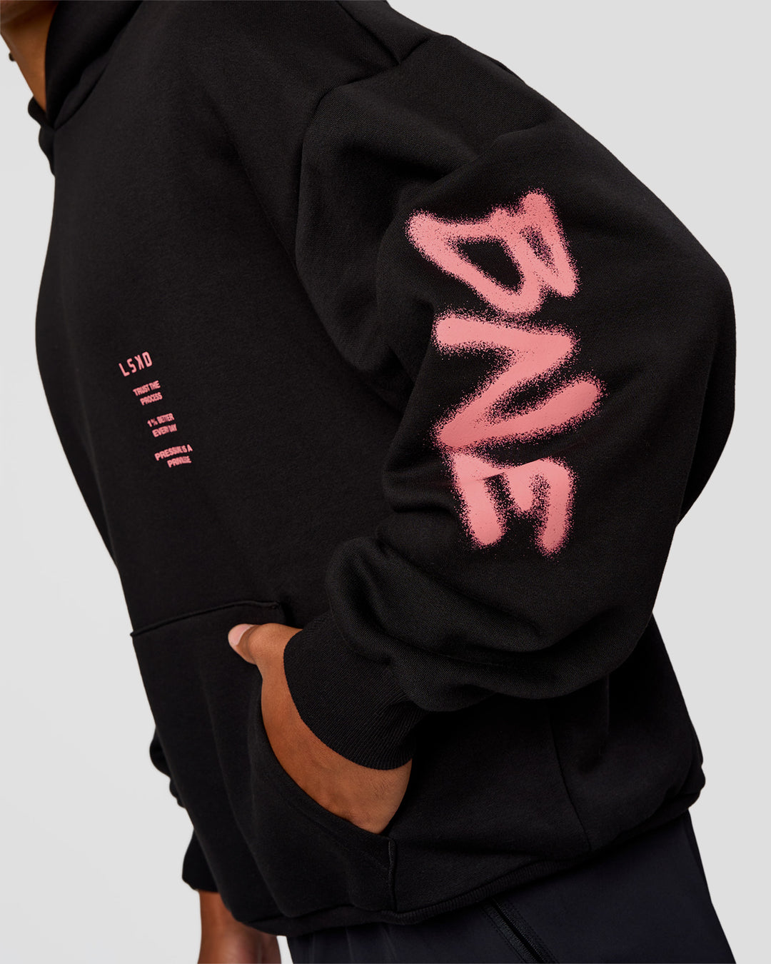 Man wearing CFT BNE 26 Unisex Oversized Hoodie - Black-Candy Pink | Model:Malebo | Size:M - view 4