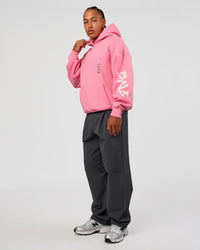 Man wearing CFT BNE 26 Unisex Oversized Hoodie - Candy Pink-Black | Model:Malebo | Size:M | Thumbnail Index: 10