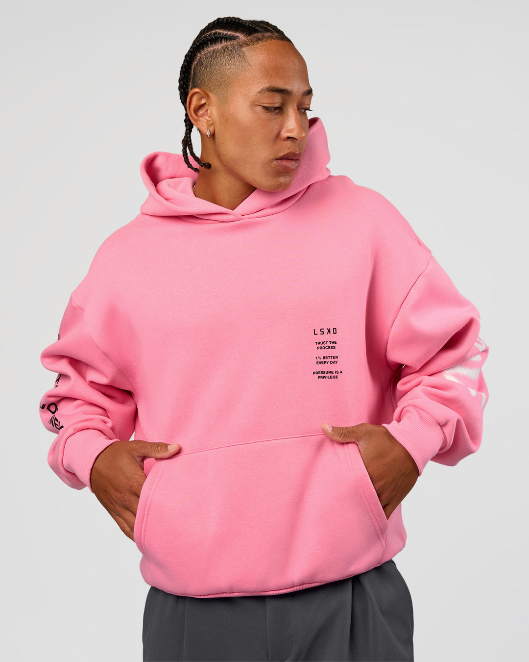 Man wearing CFT BNE 26 Unisex Oversized Hoodie - Candy Pink-Black | Model:Malebo | Size:M - view 8