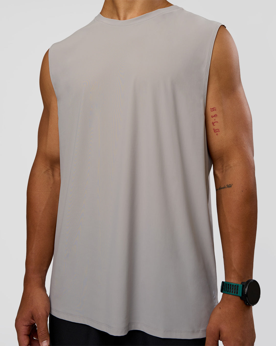 Man wearing Cadence MicroMotion Muscle Tank - Alloy-Carbon Green | Model:George | Size:M
