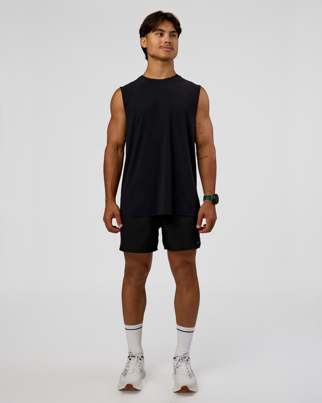 Man wearing Cadence MicroMotion Muscle Tank - Black-Blue Aura | Model:George | Size:M