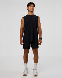 Man wearing Cadence MicroMotion Muscle Tank - Black-Blue Aura | Model:George | Size:M