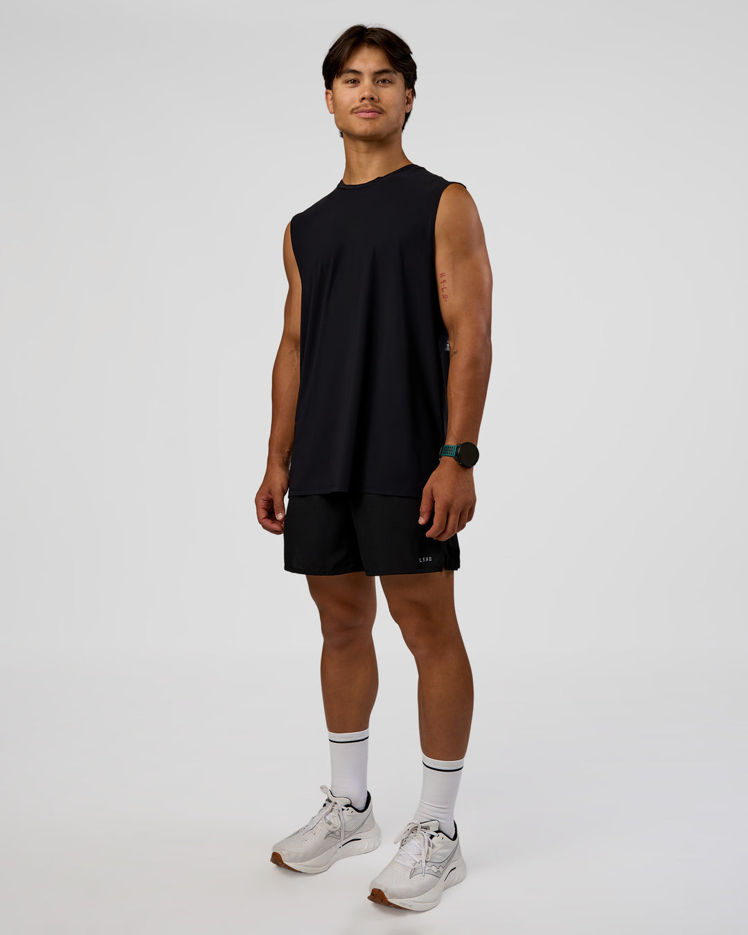 Man wearing Cadence MicroMotion Muscle Tank - Black-Blue Aura | Model:George | Size:M