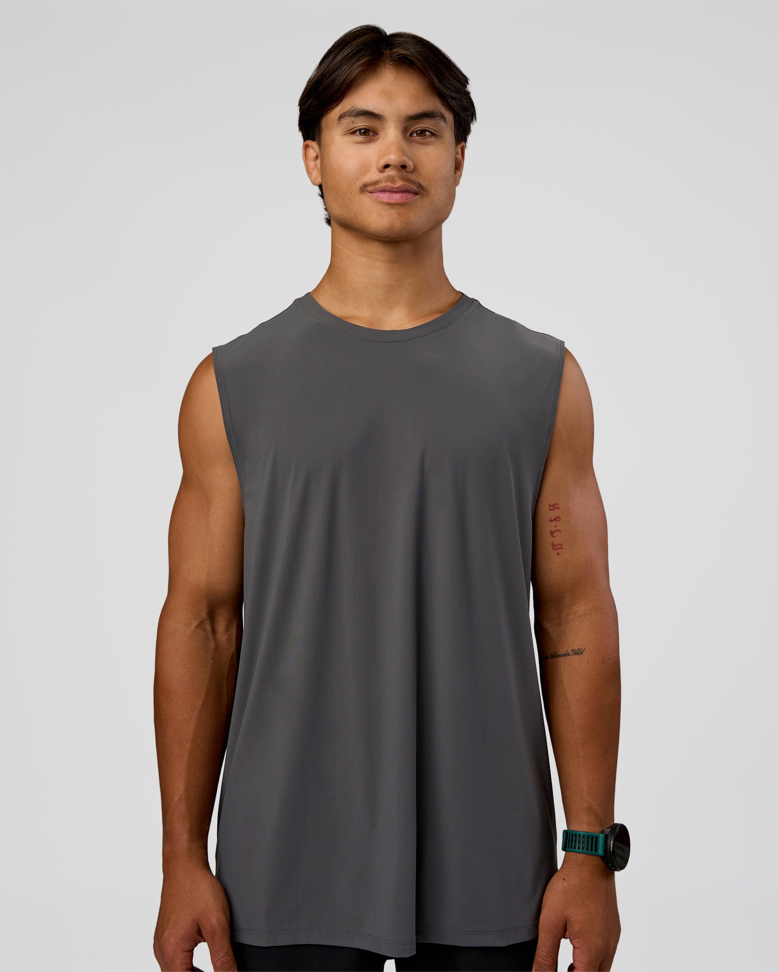 Man wearing Cadence MicroMotion Muscle Tank - Dark Storm-Alloy | Model:George | Size:M