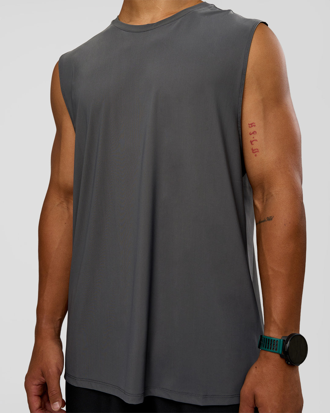 Man wearing Cadence MicroMotion Muscle Tank - Dark Storm-Alloy | Model:George | Size:M