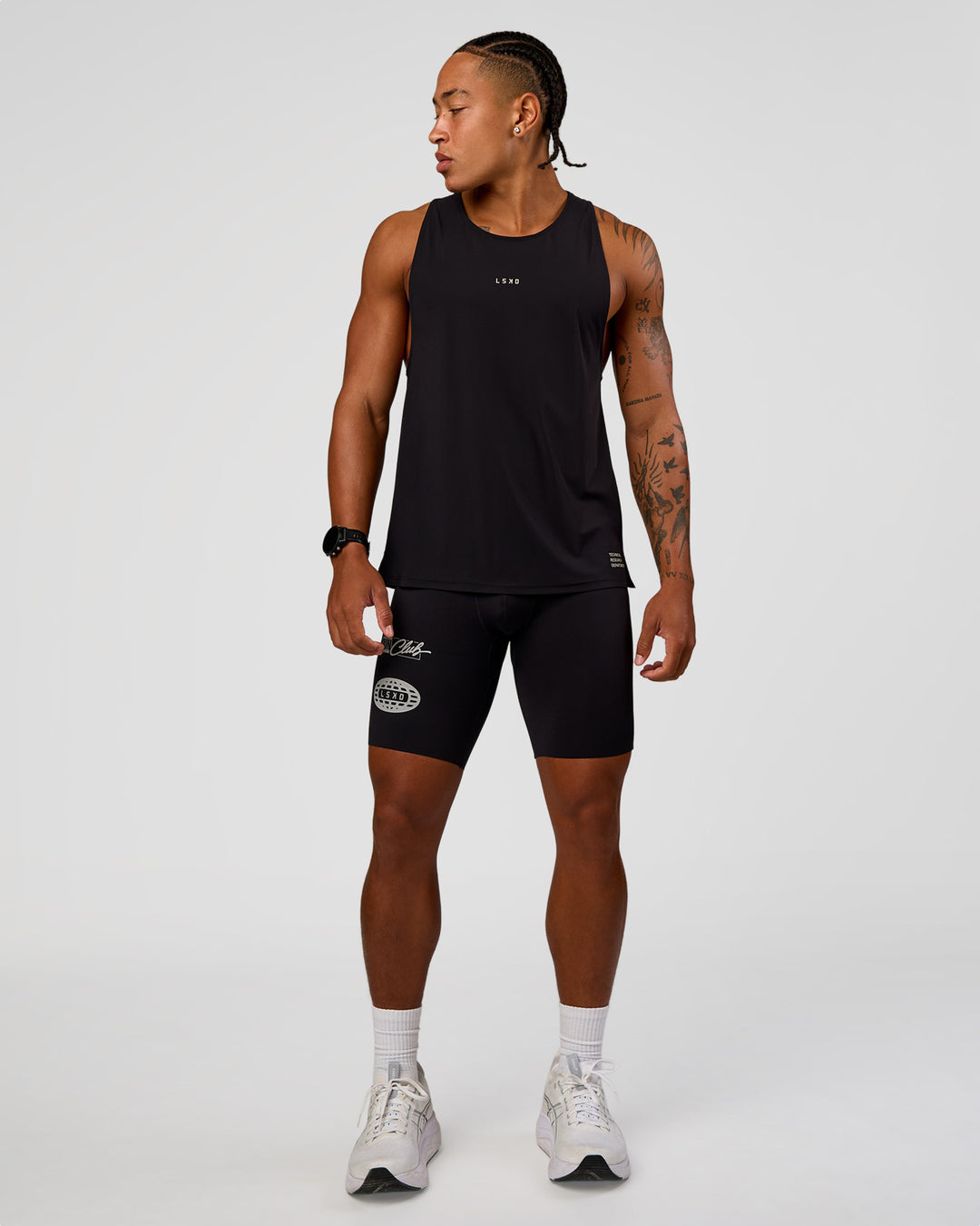 Man wearing Cadence Run Club Script Values Tank - Black-Alloy | Model:Malebo | Size:M
