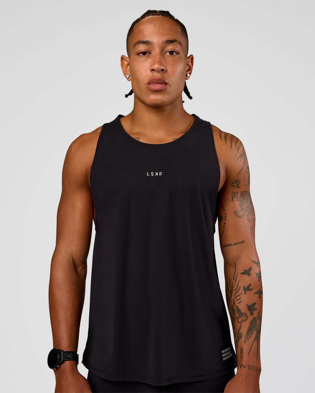 Man wearing Cadence Run Club Script Values Tank - Black-Alloy | Model:Malebo | Size:M